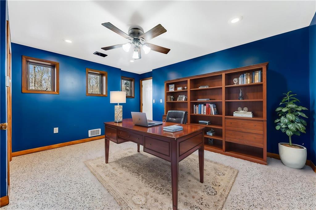 440 Steiner Bridge Road Valencia, PA 16059 - Photo 20 of 45 a view of a workspace with a bookshelf