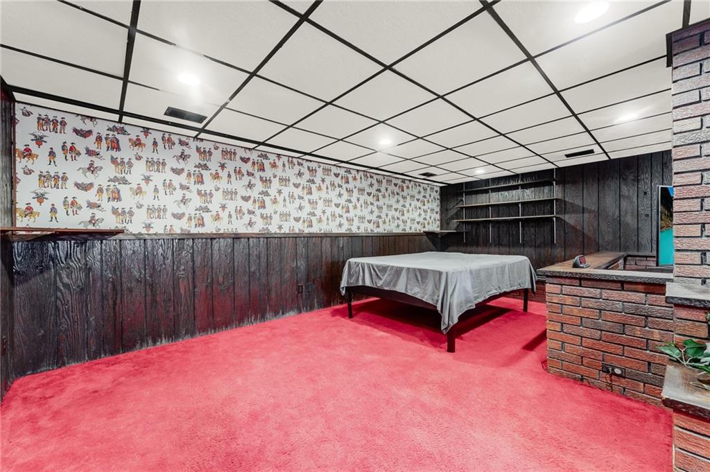 440 Steiner Bridge Road Valencia, PA 16059 - Photo 31 of 45 a bedroom with a bed and a mirror