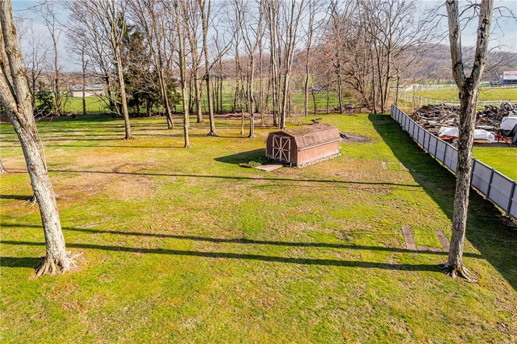 440 Steiner Bridge Road Valencia, PA 16059 - Photo 36 of 45 a view of an outdoor space with swimming pool