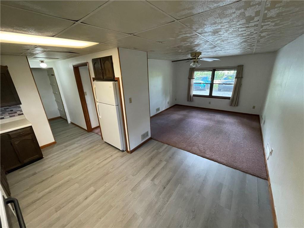 440 Steiner Bridge Road Valencia, PA 16059 - Photo 43 of 45 an empty room with wooden floor and windows