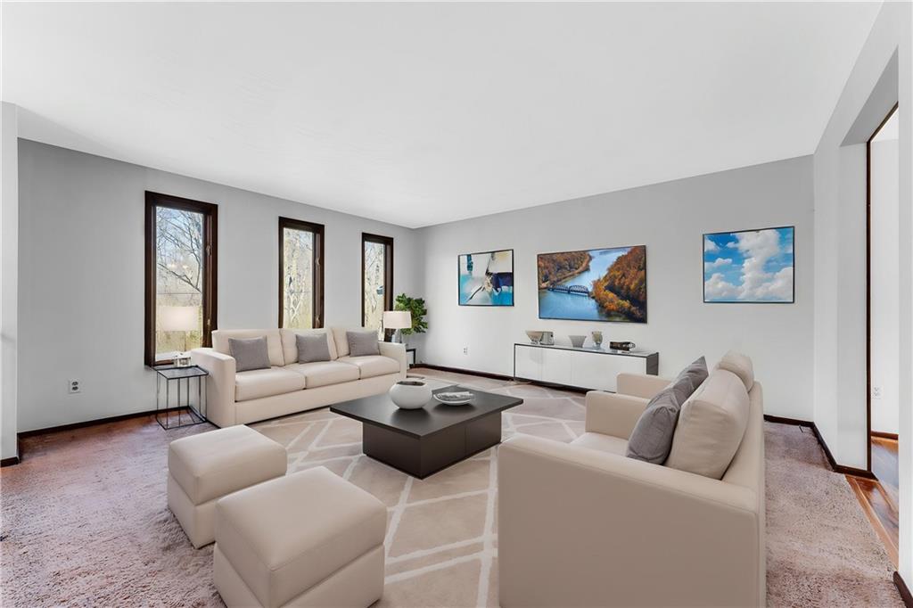 440 Steiner Bridge Road Valencia, PA 16059 - Photo 5 of 45 a living room with furniture and a couch