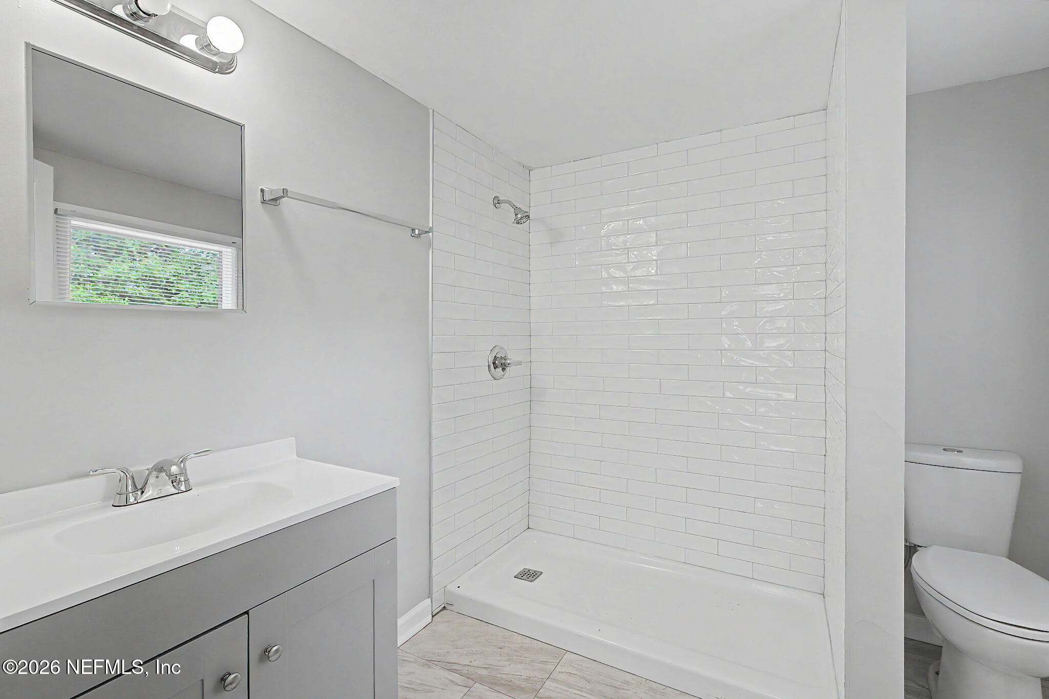 2625 Kohn Road Jacksonville, FL 32210 - Photo 25 of 34 a bathroom with a sink toilet and shower