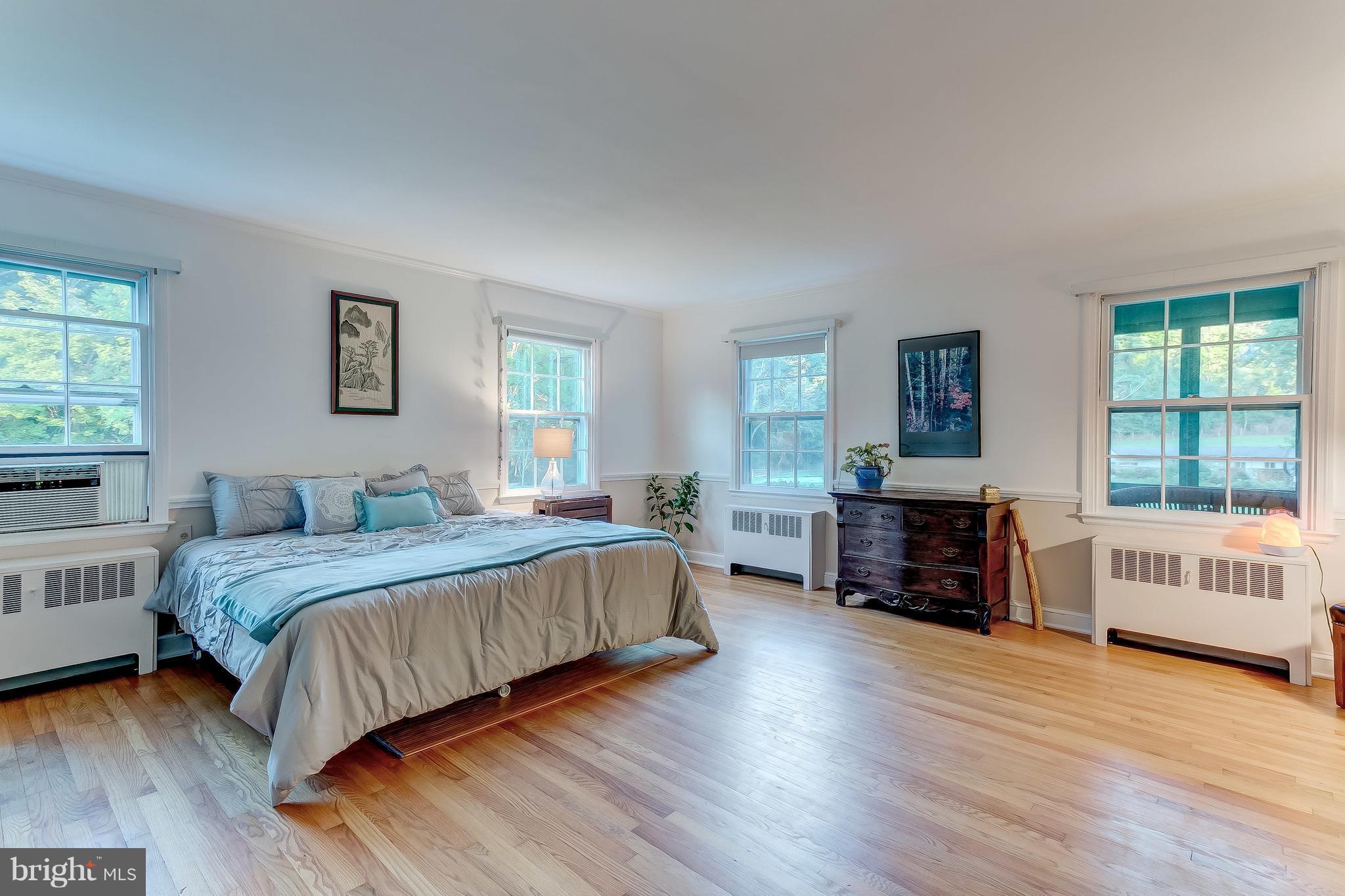 14737 Carroll Road Phoenix, MD 21131 - Photo 15 of 30 a bedroom with a bed and a couch