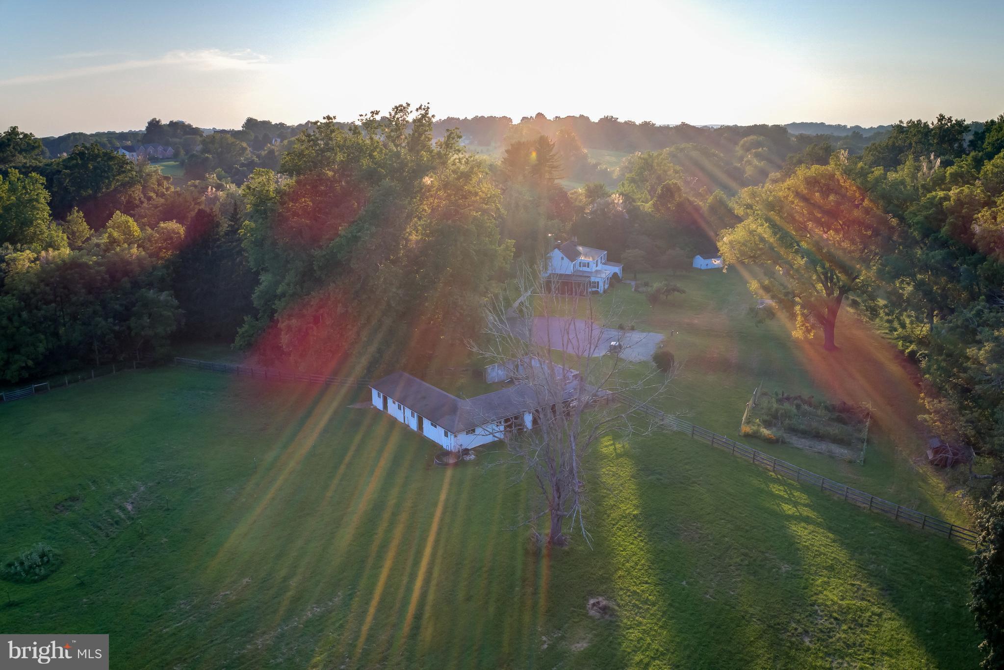 14737 Carroll Road Phoenix, MD 21131 - Photo 6 of 30 a aerial view of residential houses with outdoor space and trees