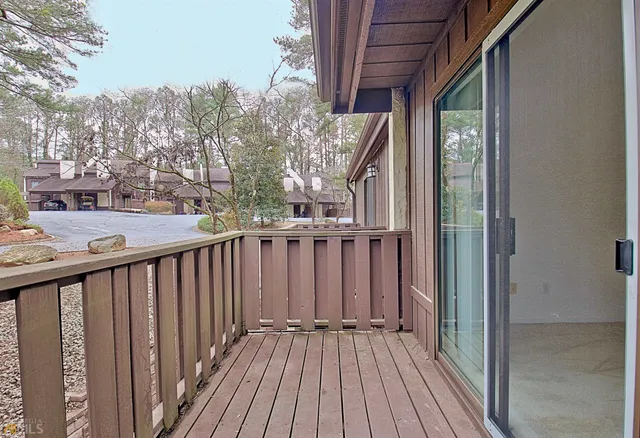 a bathroom with a sink toilet and a mirror