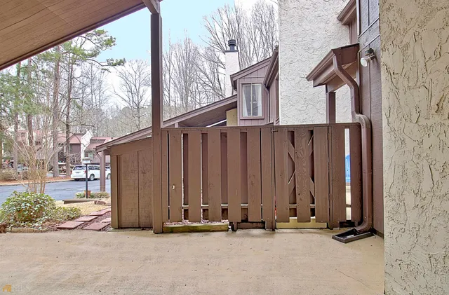 an empty room with a empty space and windows