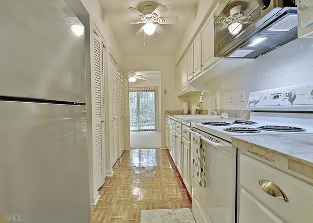 a view of empty room with windows