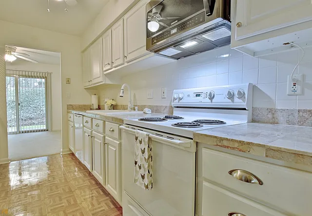 a view of balcony with wooden floor