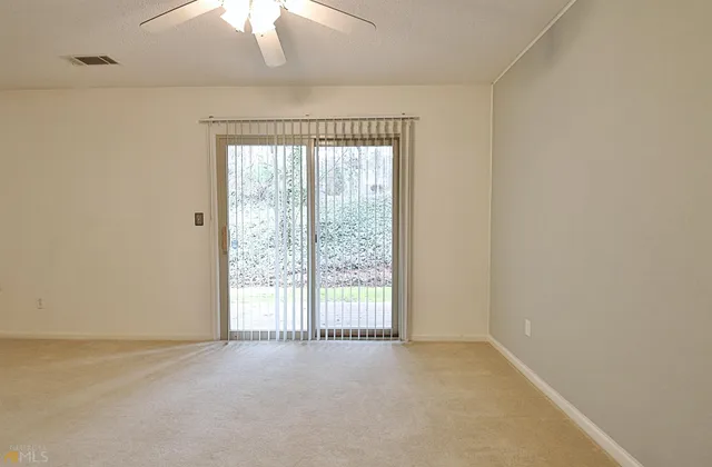 a bathroom with a bathtub and a toilet