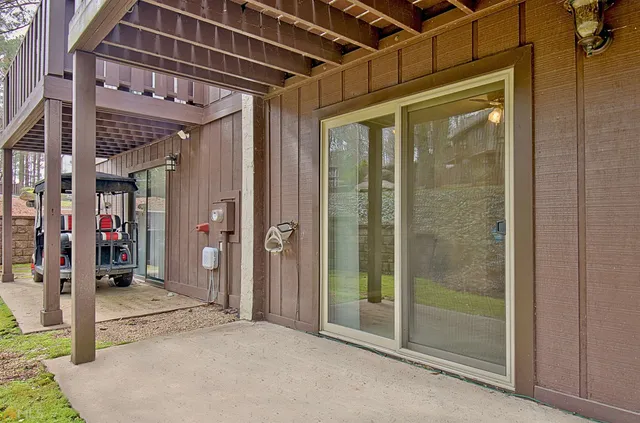 a view of a swimming pool with a patio