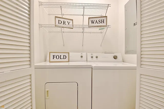 a view of balcony with wooden floor and fence