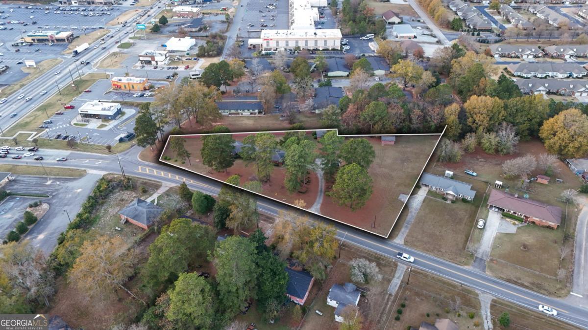 1231 Dunlap Road Northeast Milledgeville, GA 31061 - Photo 5 of 11 an aerial view of a city
