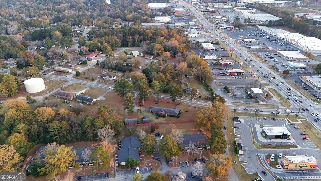 1231 Dunlap Road Northeast Milledgeville, GA 31061 - Photo 10 of 11 an aerial view of residential houses with outdoor space