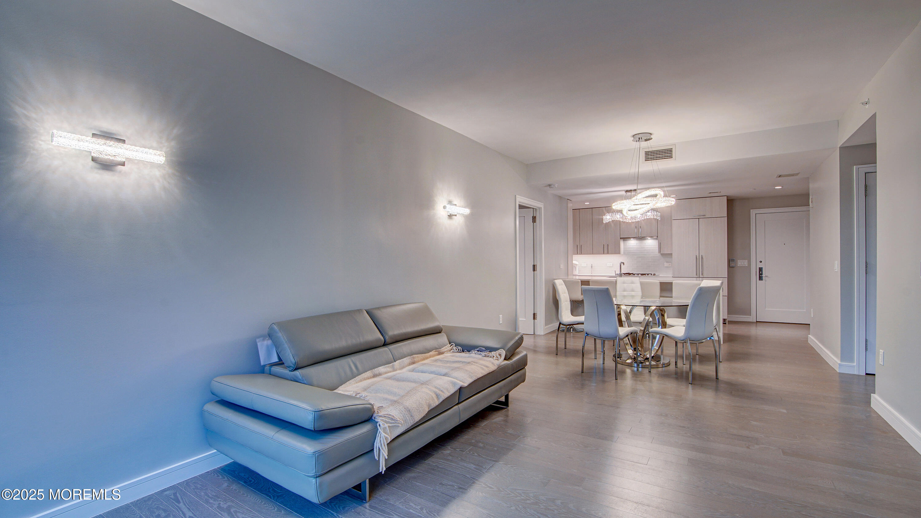 15 Morris Avenue, Unit 507 Long Branch, NJ 07740 - Photo 17 of 52 a living room with furniture and a wooden floor