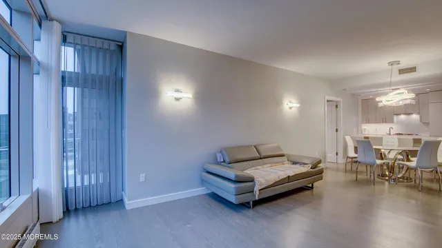 a view of a hallway with wooden shelves