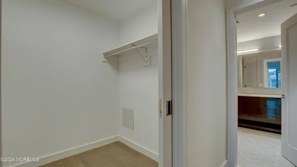 a view of a glass door and wooden floor