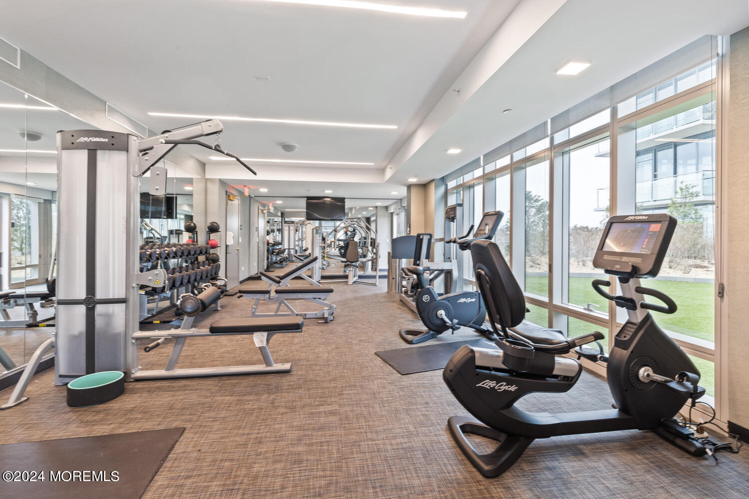 15 Morris Avenue, Unit 507 Long Branch, NJ 07740 - Photo 41 of 52 a view of a room with gym equipment