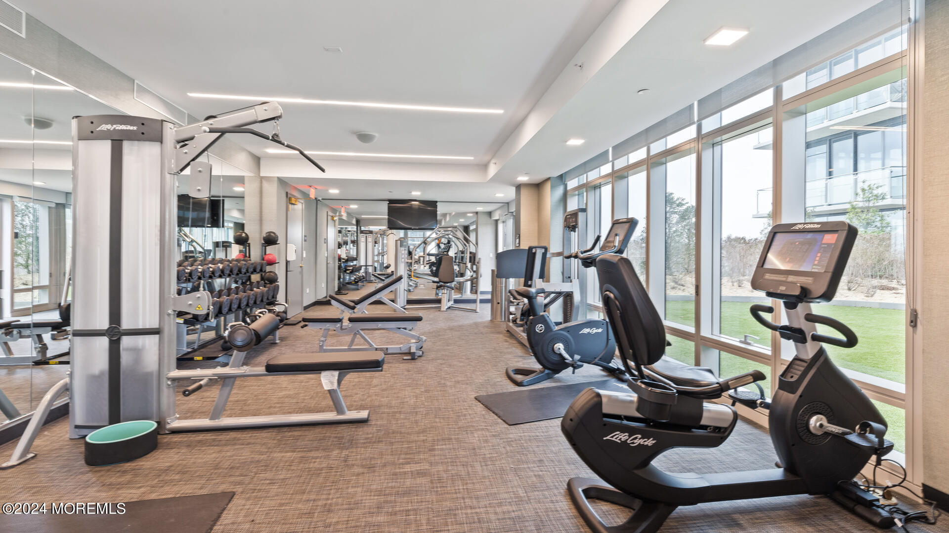 15 Morris Avenue, Unit 507 Long Branch, NJ 07740 - Photo 42 of 52 a view of a room with gym equipment