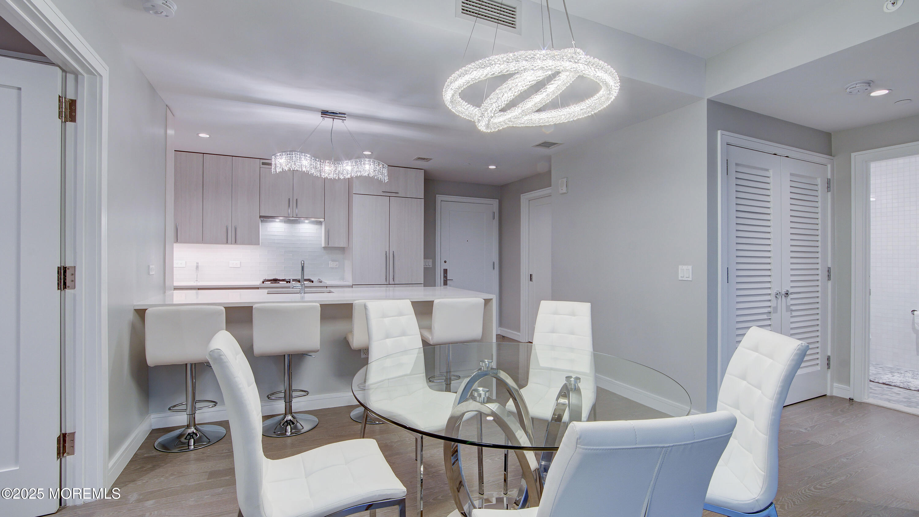 15 Morris Avenue, Unit 507 Long Branch, NJ 07740 - Photo 9 of 52 a view of kitchen and dining area with a sink