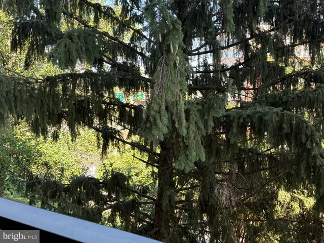 a view of a balcony with city view