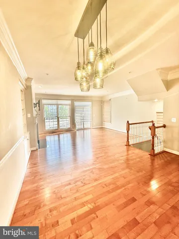 a bathroom with a sink a toilet a mirror and a shower