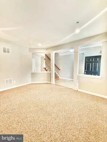 a spacious bathroom with a tub and shower