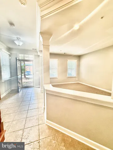 an empty room with a natural light