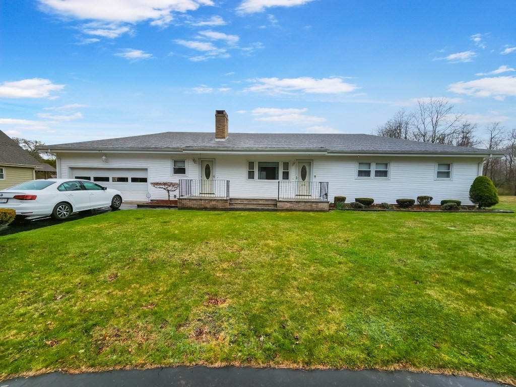 415 Chase Road Dartmouth, MA 02747 - Photo 1 of 34 a front view of house with yard