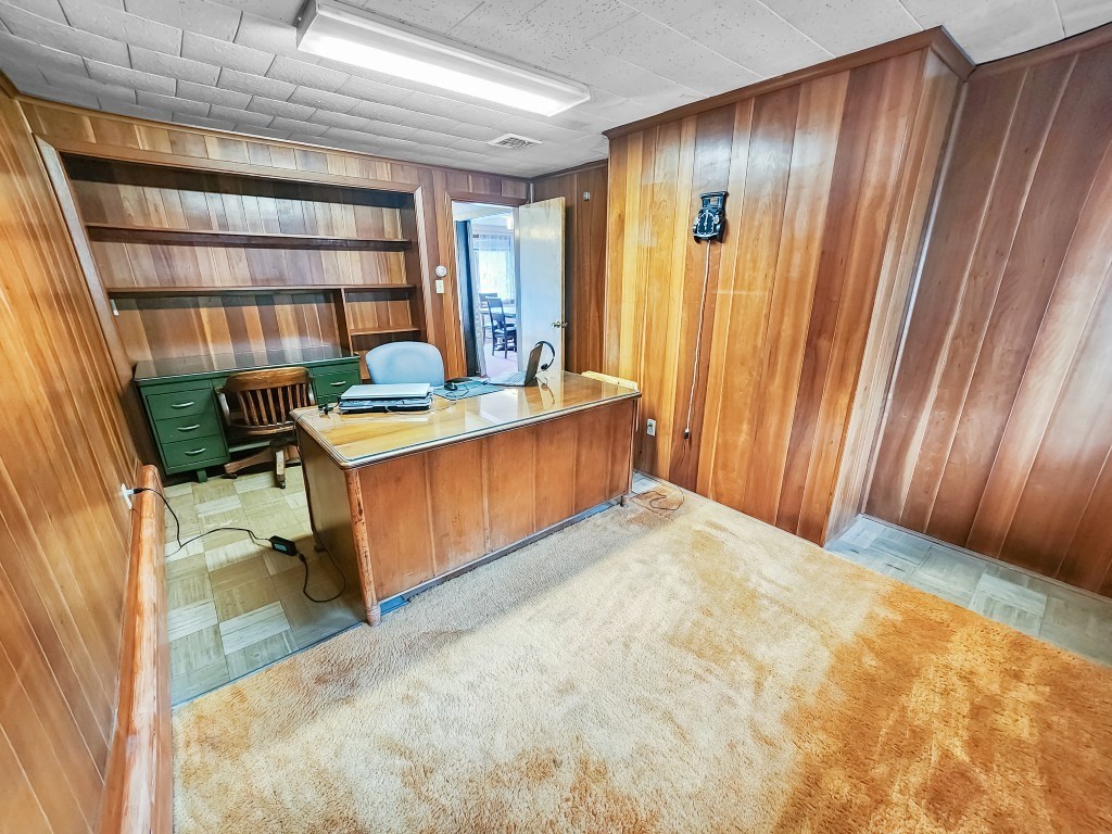 415 Chase Road Dartmouth, MA 02747 - Photo 13 of 34 a bed room with a bed and a book shelf