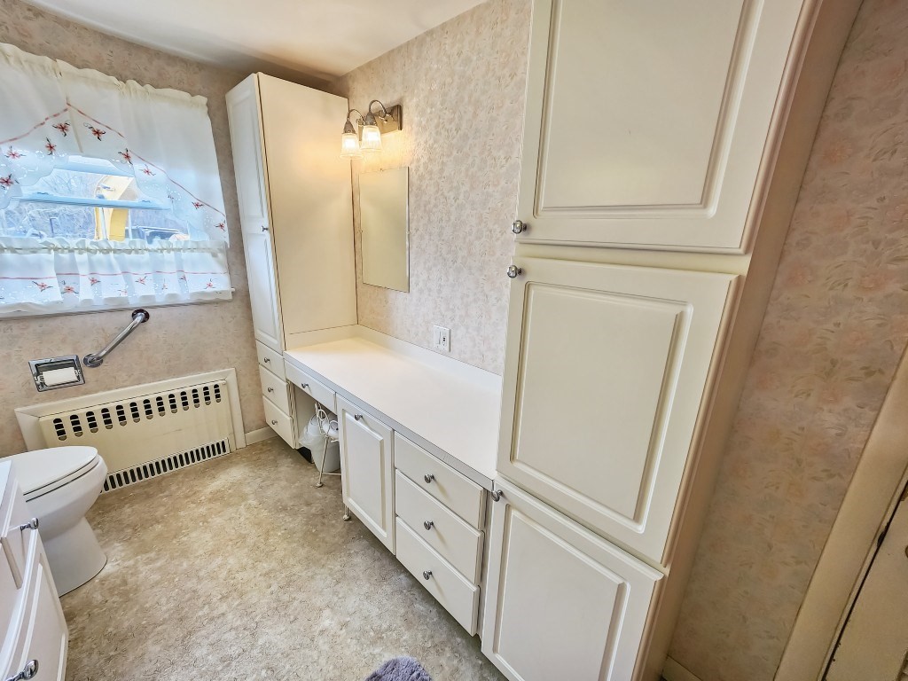 415 Chase Road Dartmouth, MA 02747 - Photo 19 of 34 a bathroom with a sink and a mirror