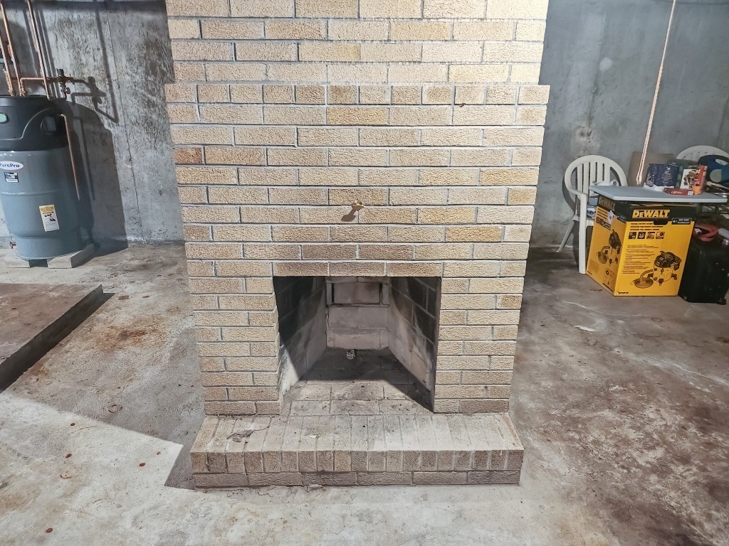 415 Chase Road Dartmouth, MA 02747 - Photo 28 of 34 a view of a fireplace