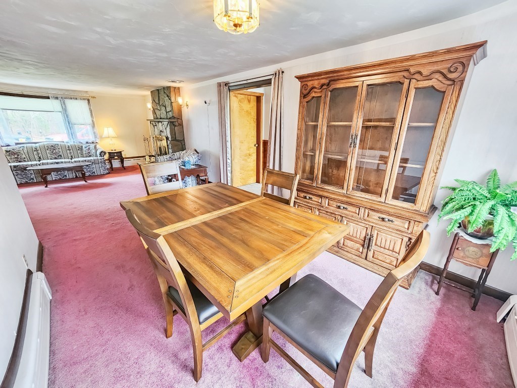 415 Chase Road Dartmouth, MA 02747 - Photo 7 of 34 a living room with a pool table and a large window