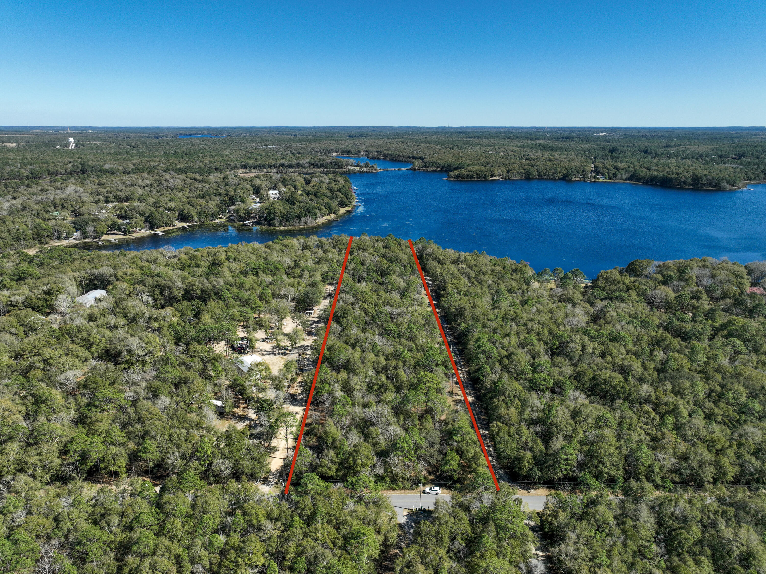 299 Holley King Road DeFuniak Springs, FL 32433 - Photo 38 of 40 a view of a yard with an ocean
