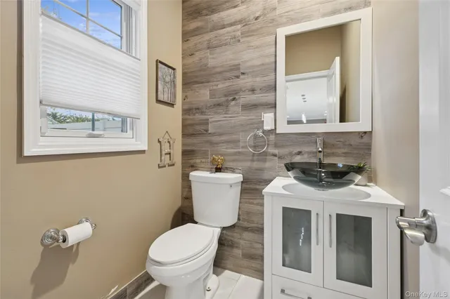 a kitchen with a table and chairs in it
