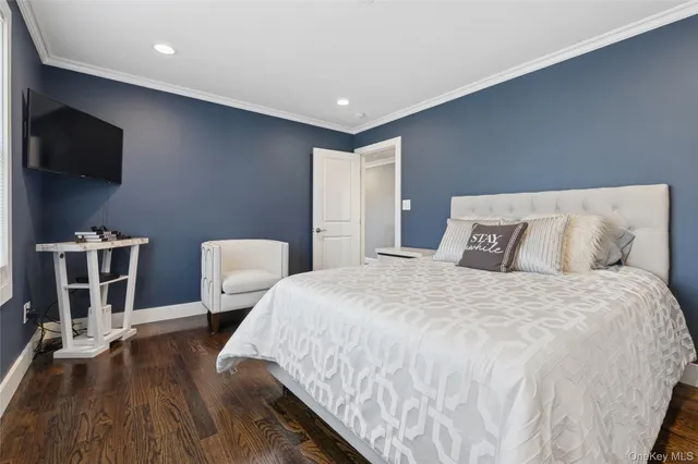 a bathroom with a toilet sink and shower