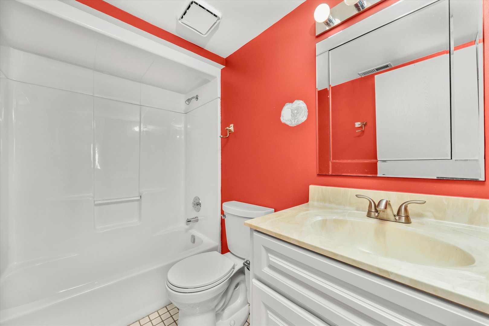 4530 West 93rd Street, Unit 1A Oak Lawn, IL 60453 - Photo 14 of 18 a bathroom with a sink a toilet and shower