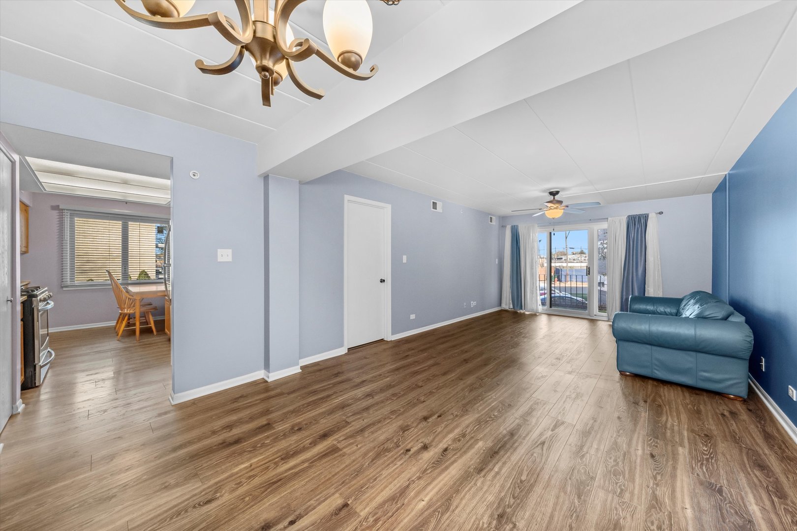 4530 West 93rd Street, Unit 1A Oak Lawn, IL 60453 - Photo 7 of 18 a view of livingroom with furniture and wooden floor