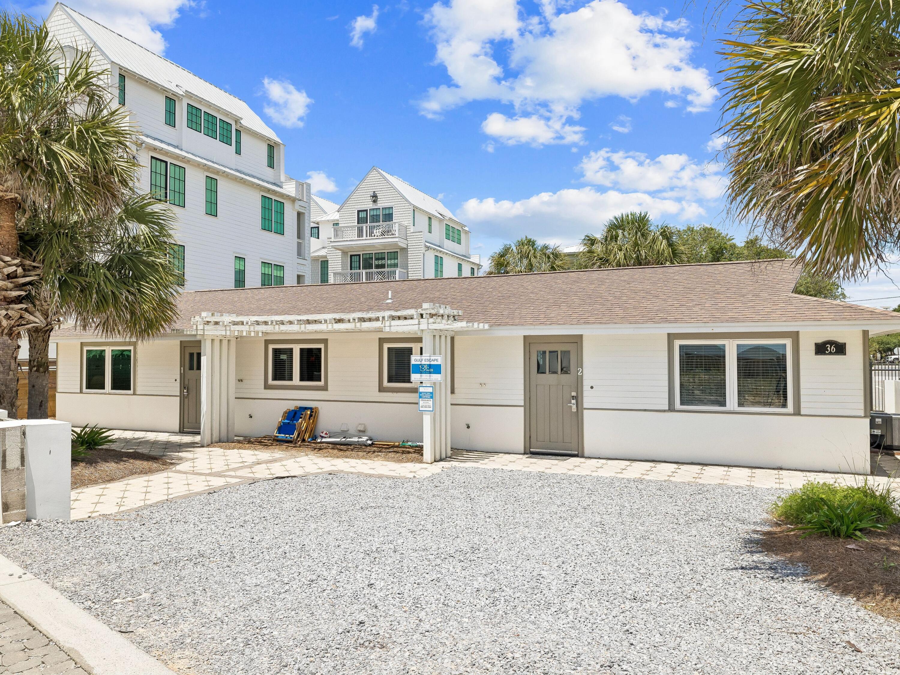36 Green Street Inlet Beach, FL 32461 - Photo 24 of 27 a view of a white house with a large space