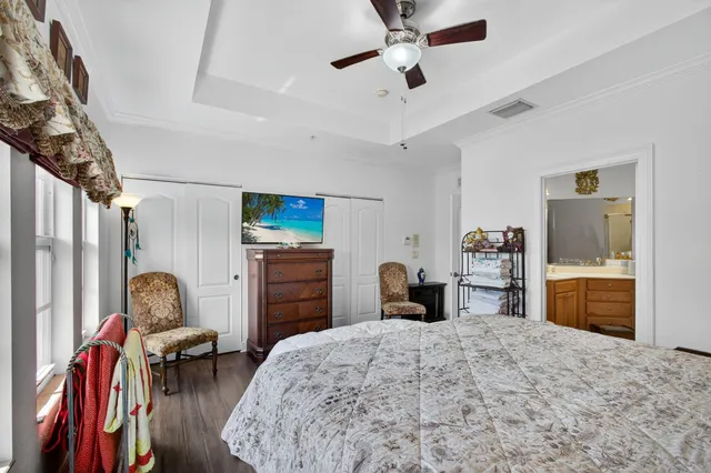 a bedroom with furniture and a bed