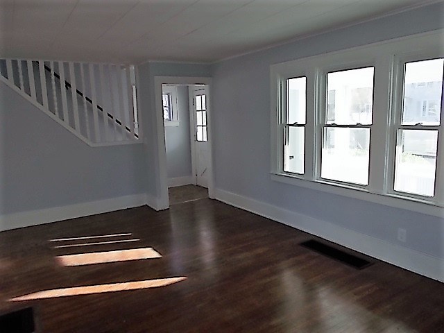 138 Rand Street Rochester, NY 14615 - Photo 5 of 14 Bright Living room with Charming Staircase