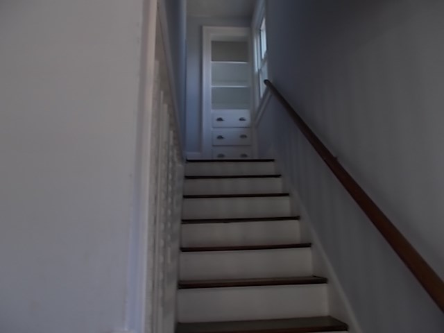 138 Rand Street Rochester, NY 14615 - Photo 6 of 14 Custom Built in Shelving at top of staircase
