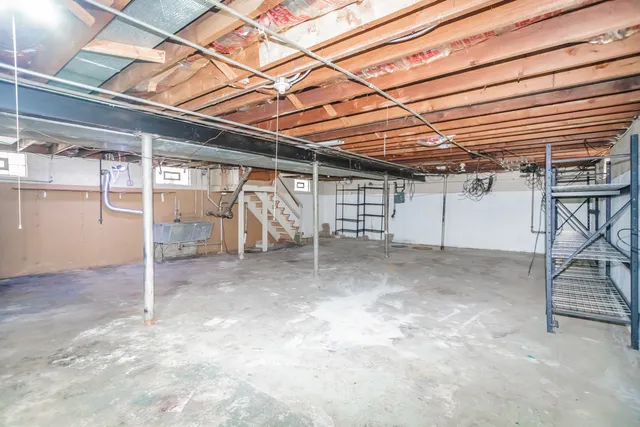 a view of a room with wooden roof