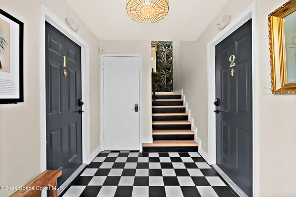 a kitchen with stainless steel appliances granite countertop a stove a sink and a cabinets