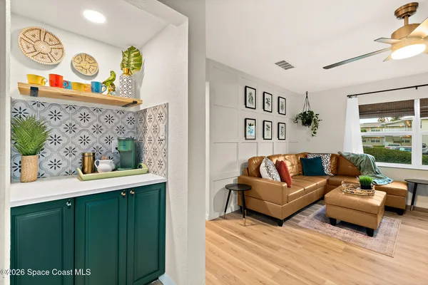 a bedroom with a bed and ceiling fan