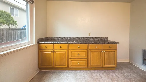 an entryway with wooden floor