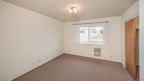 an empty room with a window