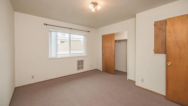 an empty room with windows