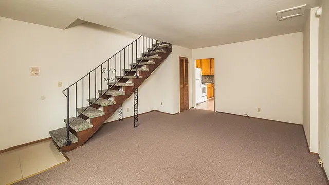 a view of entryway with stairs