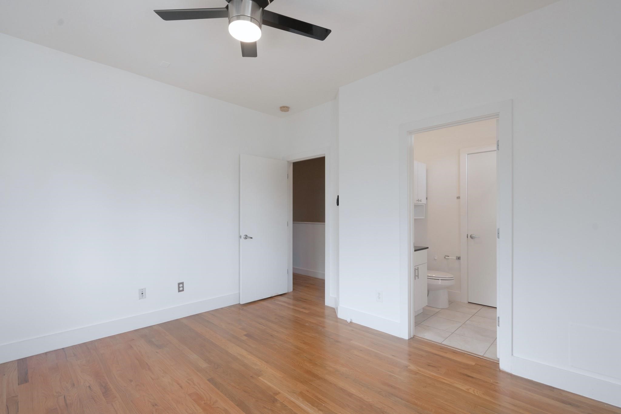4302 Spencer Street Houston, TX 77007 - Photo 12 of 21 wooden floor in an empty room
