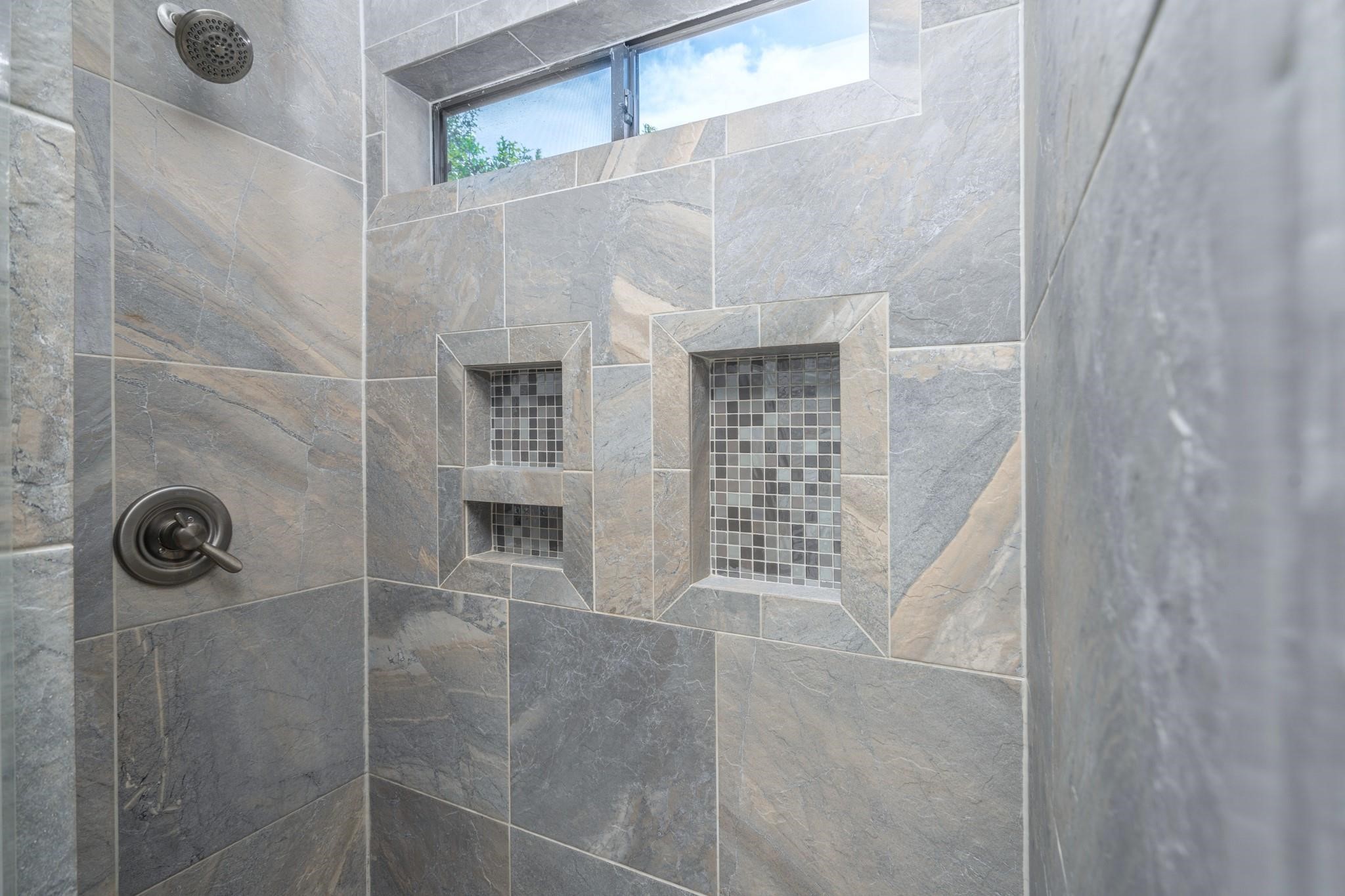 4302 Spencer Street Houston, TX 77007 - Photo 10 of 21 a bathroom with a shower